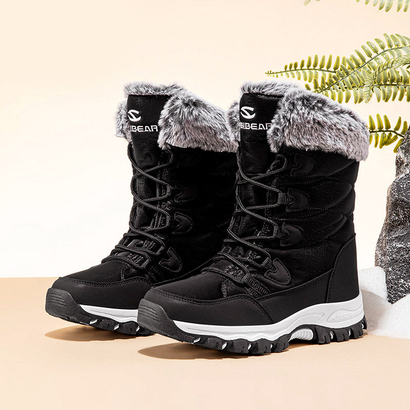 Women's mid-calf winter boots with fur lining, waterproof upper, and deep-tread grip sole for snow