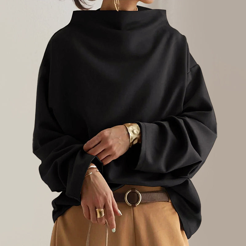 Women's oversized top in neutral tone, relaxed fit, long sleeves, folded wide neckline detail