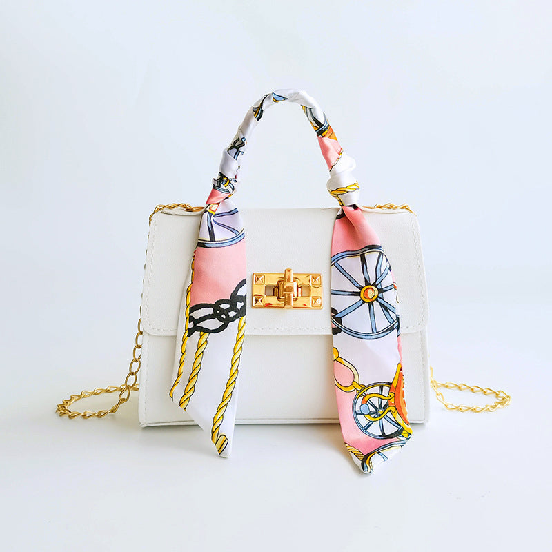 Wavlynn small structured flap bag with gold twist-lock clasp and chic scarf-wrapped top handle