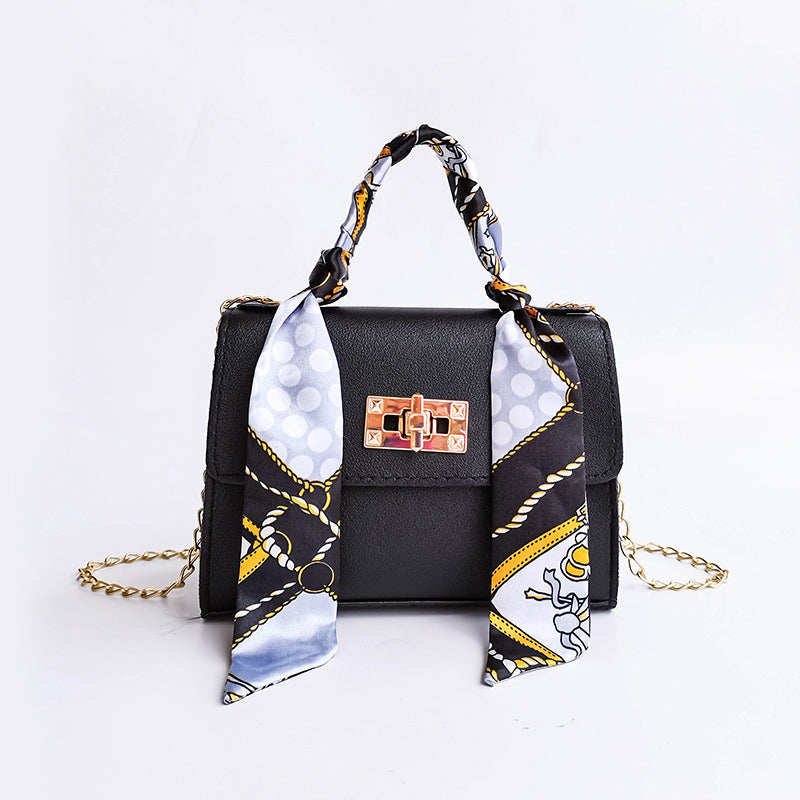 Wavlynn small structured flap bag with gold twist-lock clasp and chic scarf-wrapped top handle