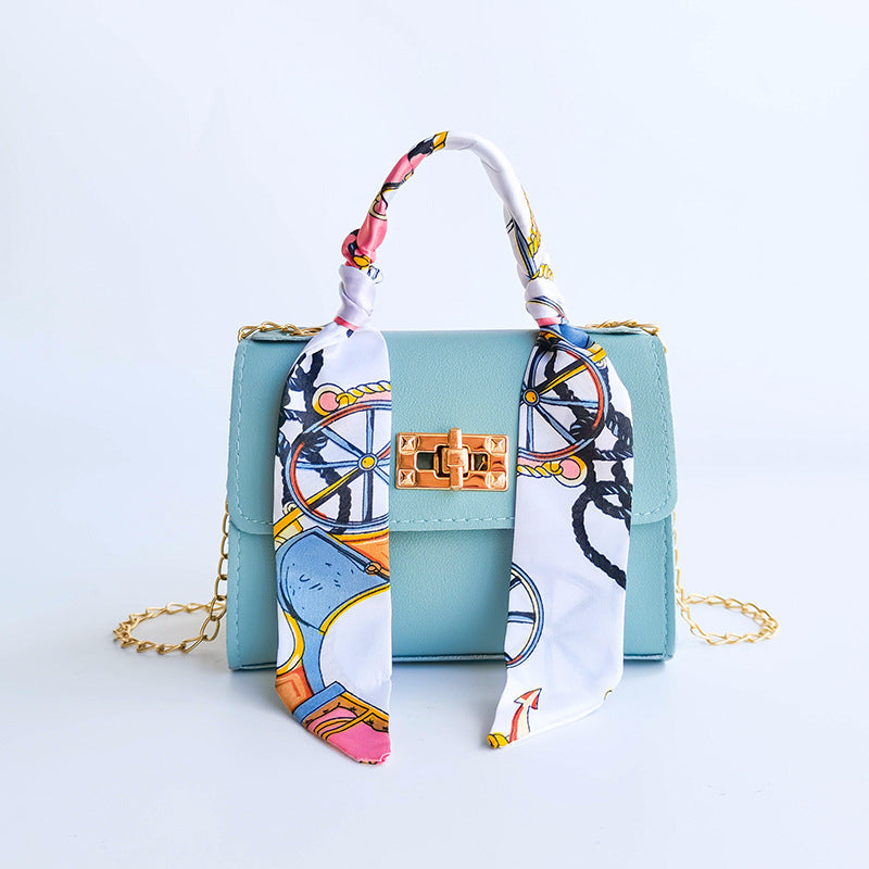 Wavlynn small structured flap bag with gold twist-lock clasp and chic scarf-wrapped top handle