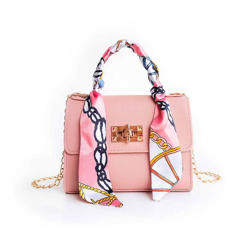 Wavlynn small structured flap bag with gold twist-lock clasp and chic scarf-wrapped top handle