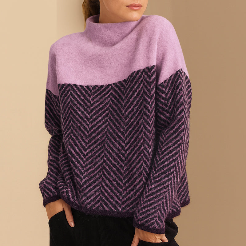 Women's hip-length chevron pattern turtleneck sweater with dropped shoulders relaxed silhouette