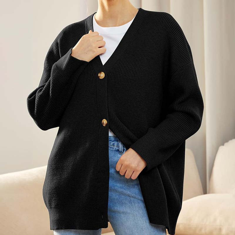 Women's oversized ribbed knit cardigan with button front closure in relaxed draped silhouette