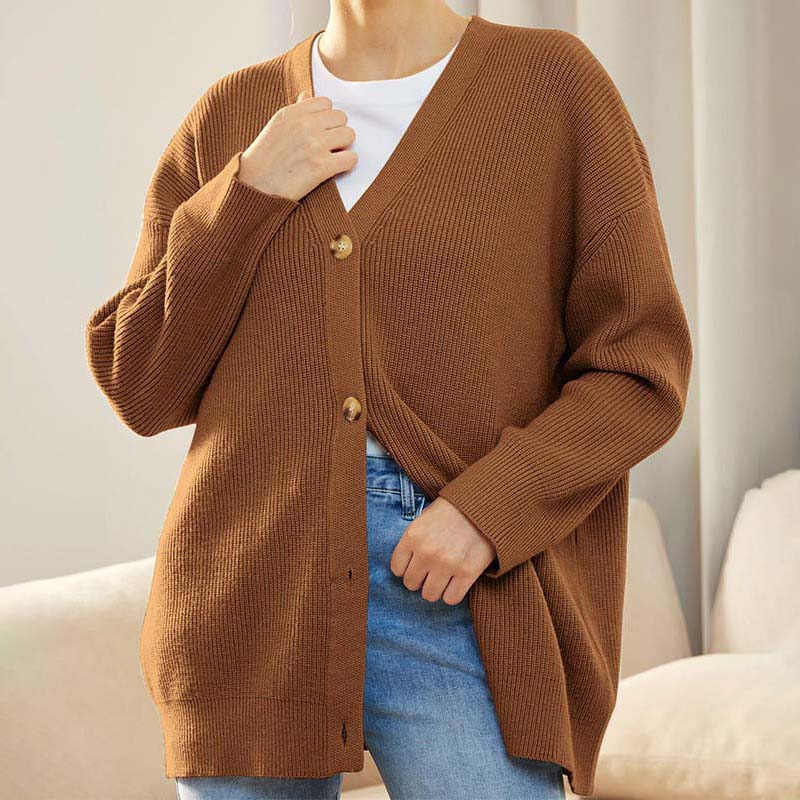 Women's oversized knit cardigan with button front, ribbed texture, relaxed draped silhouette for layering