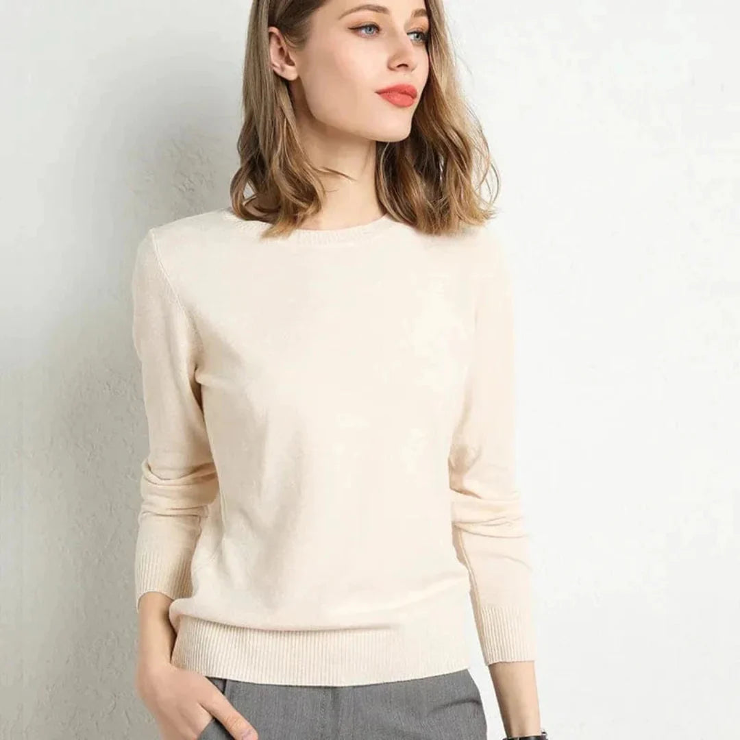 Women's ivory cashmere crew neck sweater with ribbed cuffs, ultra-soft flattering fit for work