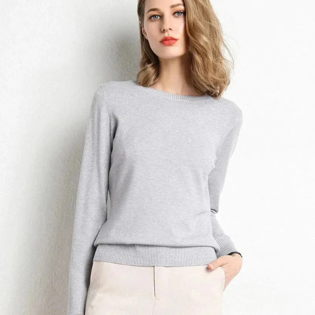 Women's soft camel cashmere crew neck sweater with ribbed cuffs and hem, flattering fit