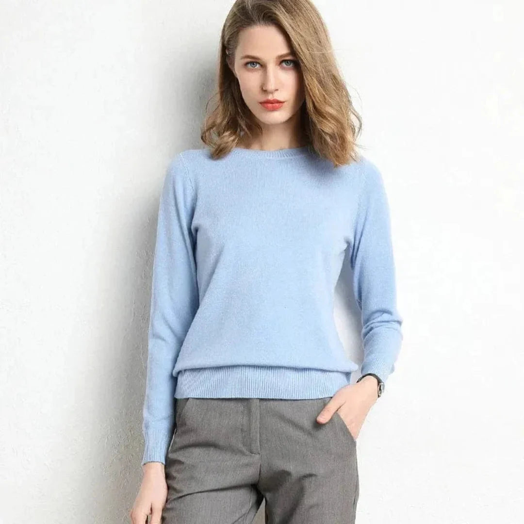 Women's ivory cashmere crew neck sweater with ribbed cuffs, ultra-soft flattering fit for work