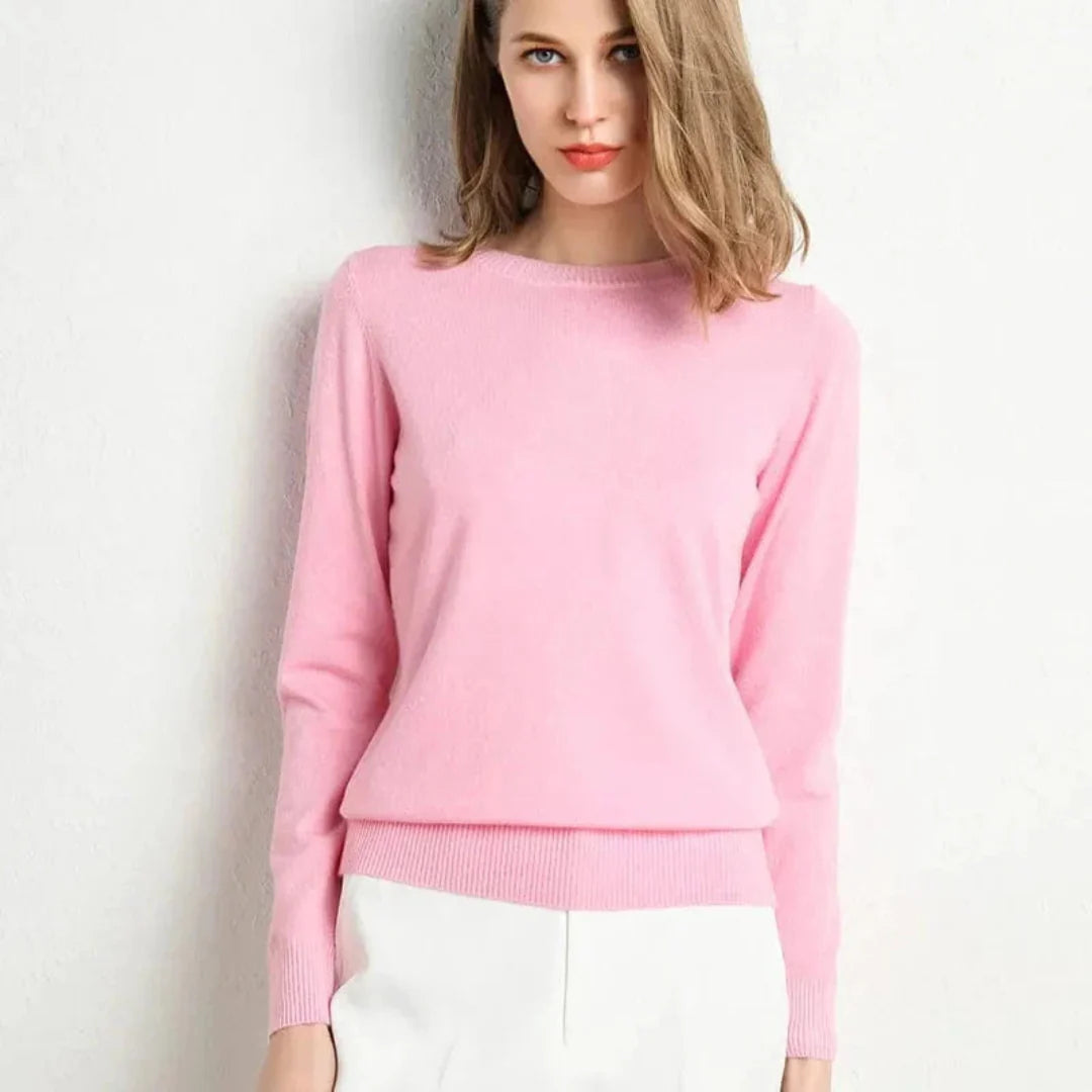 Women's cream cashmere crew neck sweater with ribbed cuffs and hem, flattering fit