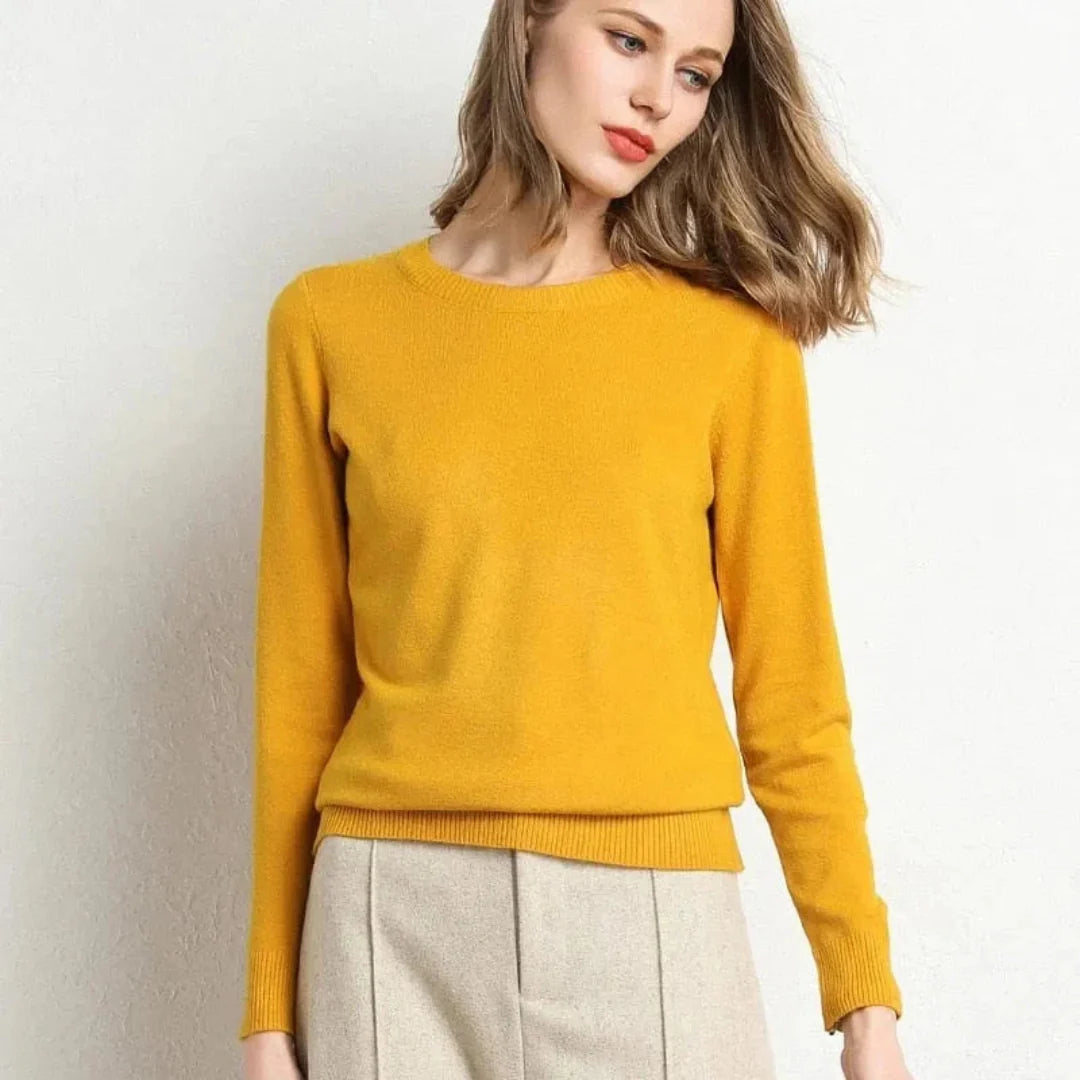 Women's ivory cashmere crew neck sweater with ribbed cuffs, ultra-soft flattering fit for work