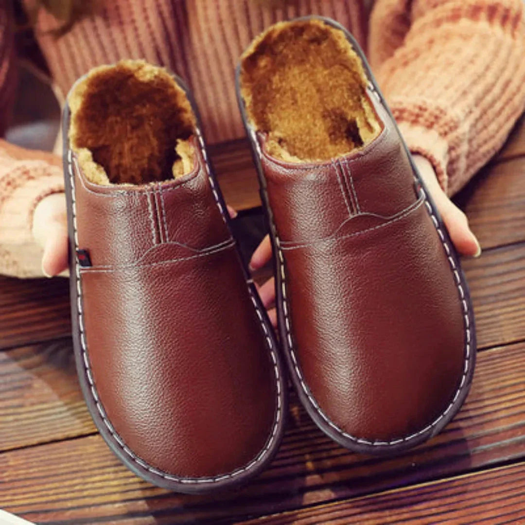 Women's faux leather slip-on sandals with soft fur lining, sleek silhouette for cozy indoor wear