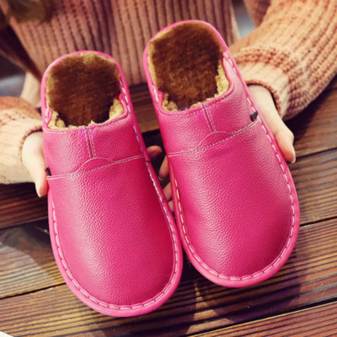 Women's faux leather slip-on sandals with plush fur lining, sleek silhouette for cozy indoor wear