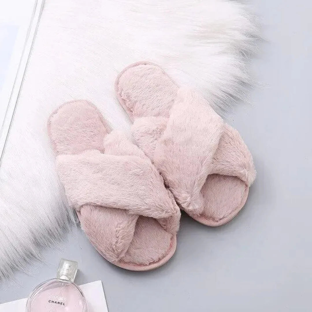Women's fluffy faux fur cross-band slippers in cozy neutral tones with slip-resistant sole