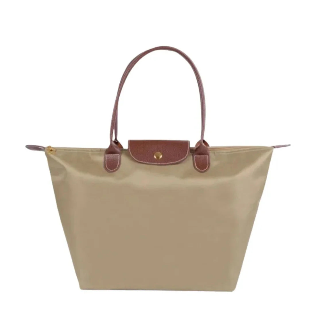Women's foldable nylon tote bag, water-resistant lightweight design with soft leather handles