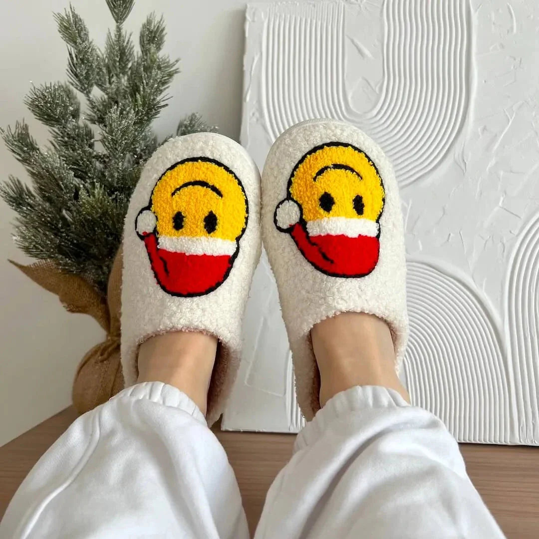Women's Christmas plush slippers with soft fleece lining, festive embroidered characters, and non-slip sole