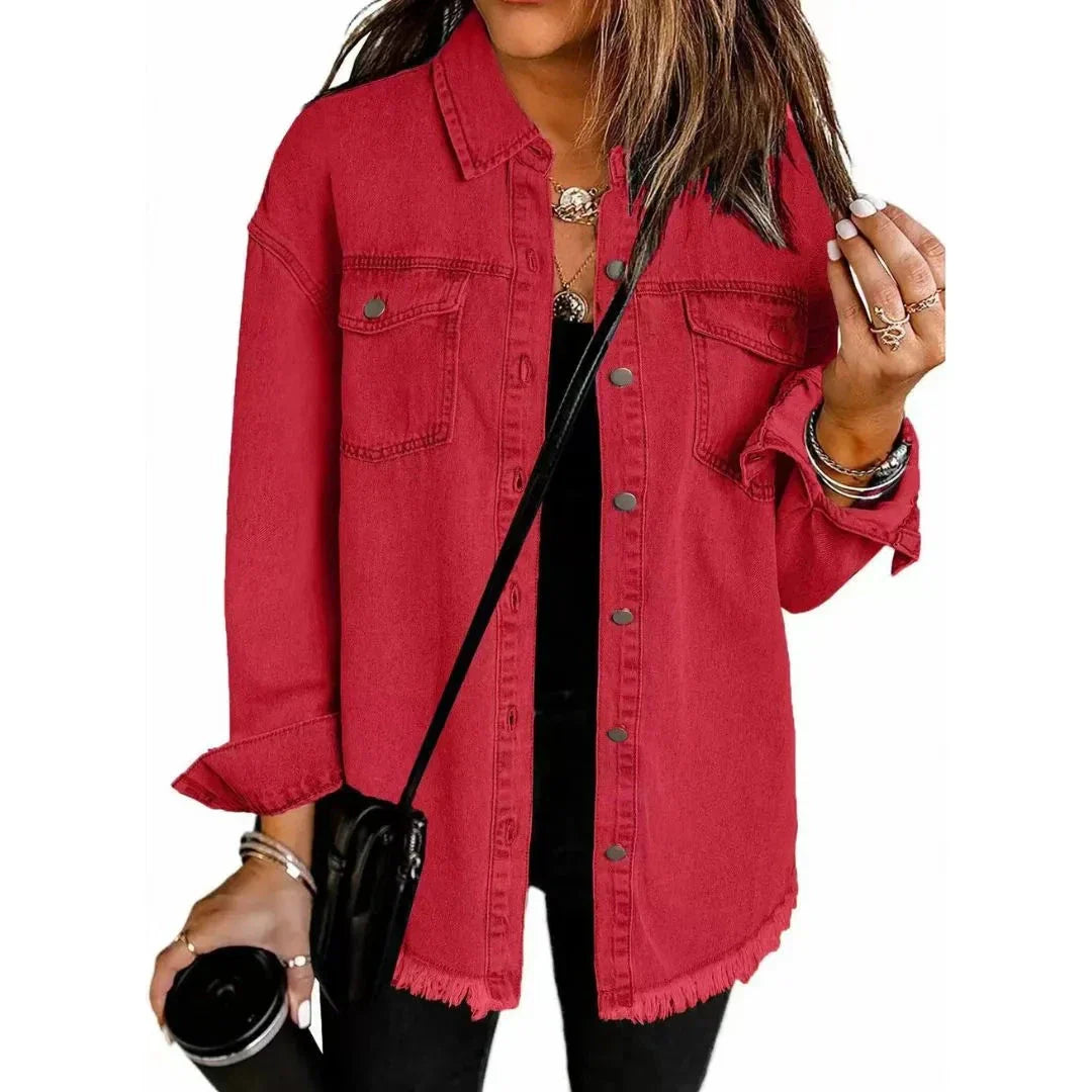 Women's oversized blue denim shirt jacket with frayed hem, relaxed fit for casual layering