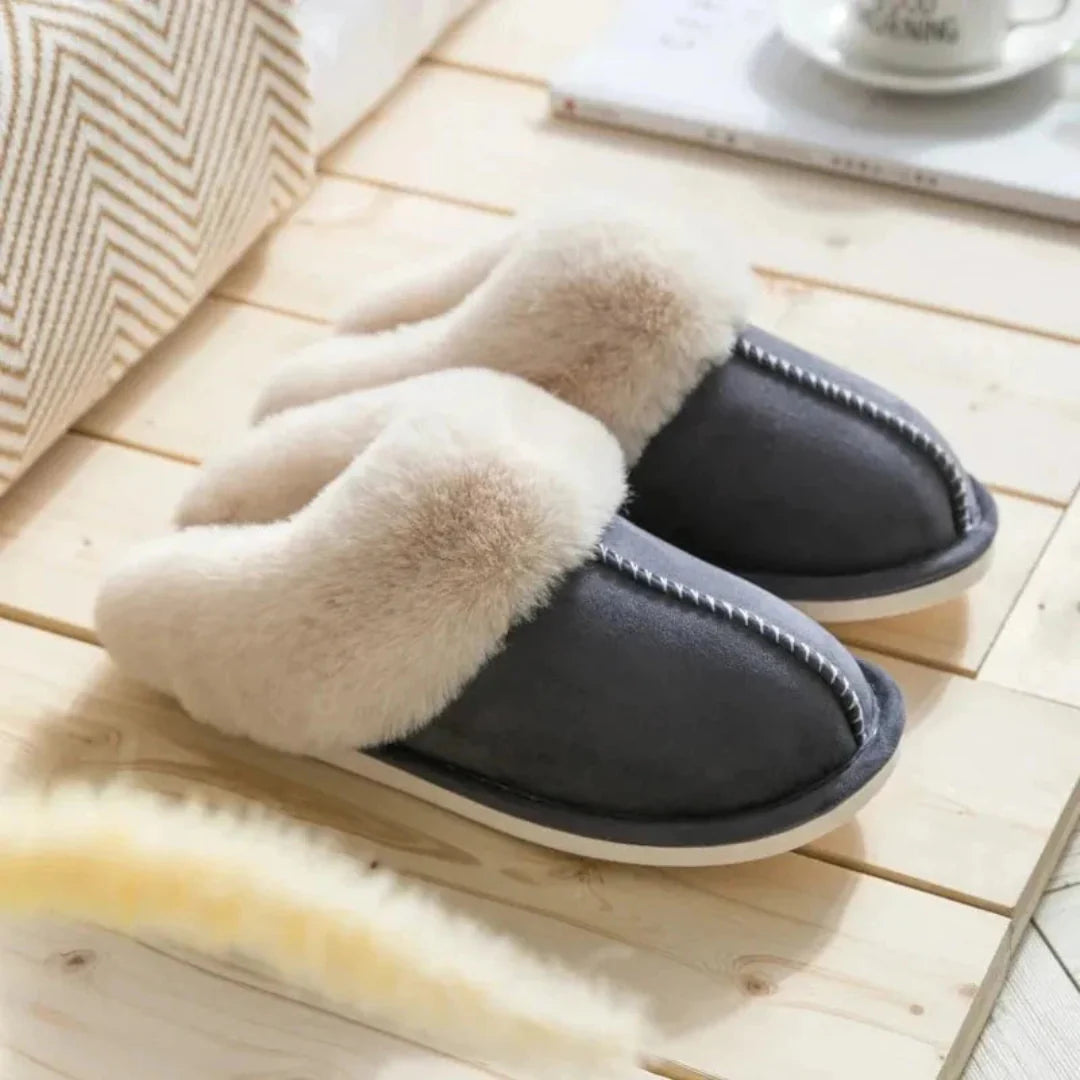 Women's plush faux fur slip-on slippers in cozy round-toe design with slip-resistant sole