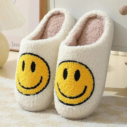 Women's yellow plush sherpa slippers with embroidered smiley face and cushioned anti-slip sole