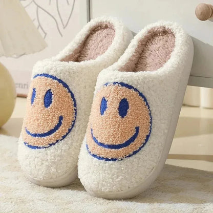 Women's yellow plush smiley face slippers with embroidered design and cushioned anti-slip sole