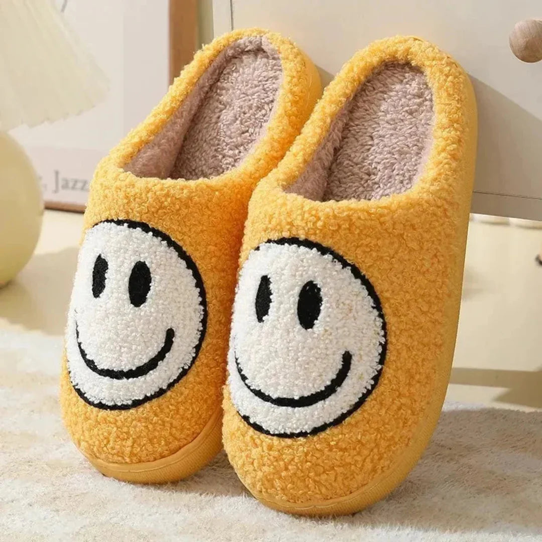 Women's beige plush sherpa slippers with embroidered smiley face and cushioned anti-slip sole