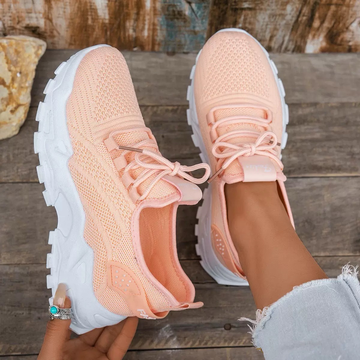 Women's chunky sole mesh lace-up walking sneakers in neutral tones with bold platform sole