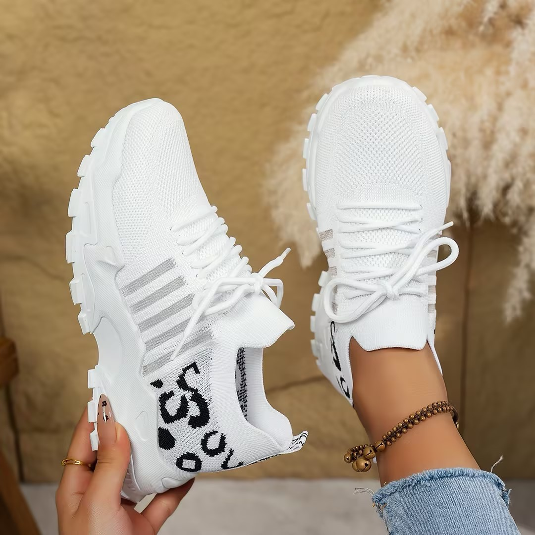 Women's chunky sole mesh lace-up walking sneakers in neutral tones with bold platform sole