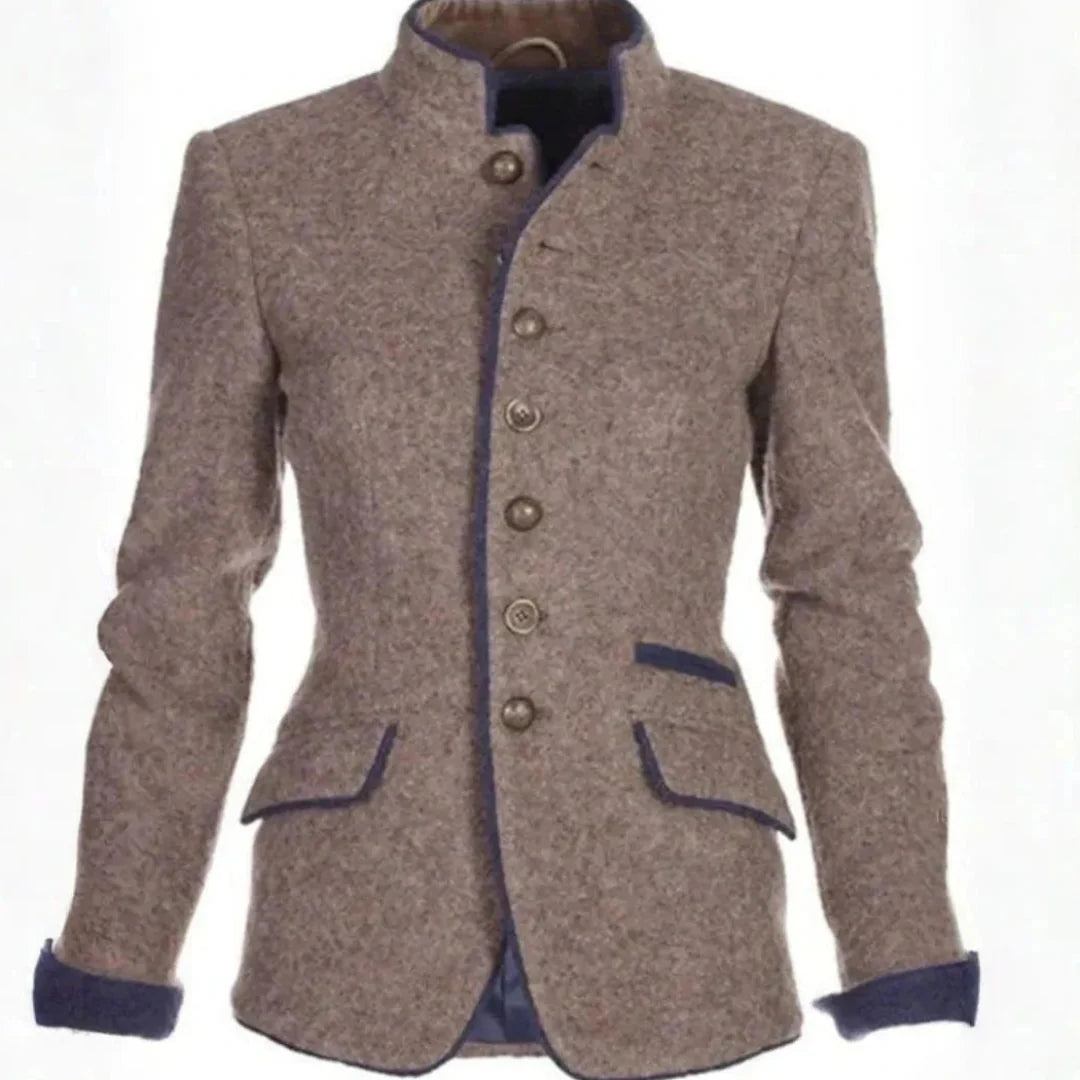 Women's tailored blazer with stand collar, contrast trim edges, button-front closure, and sculpted waist silhouette