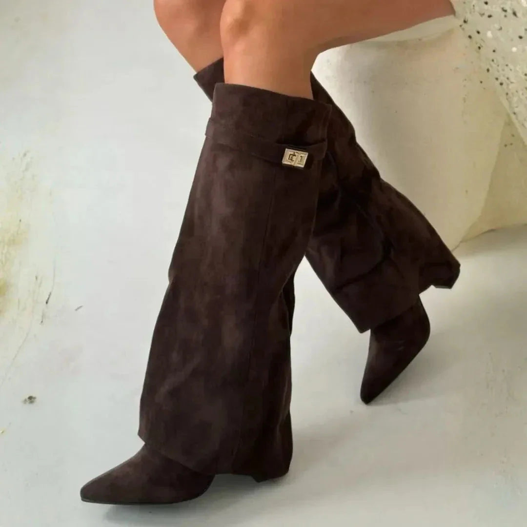 Women's brown suede knee-high boots with velvety finish and sleek streamlined silhouette
