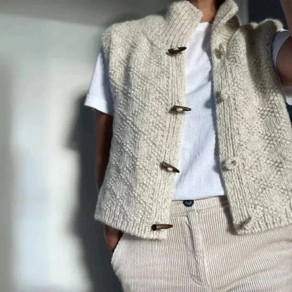 Women's toggle button wool vest in neutral tones, textured hand-knit sleeveless layering piece