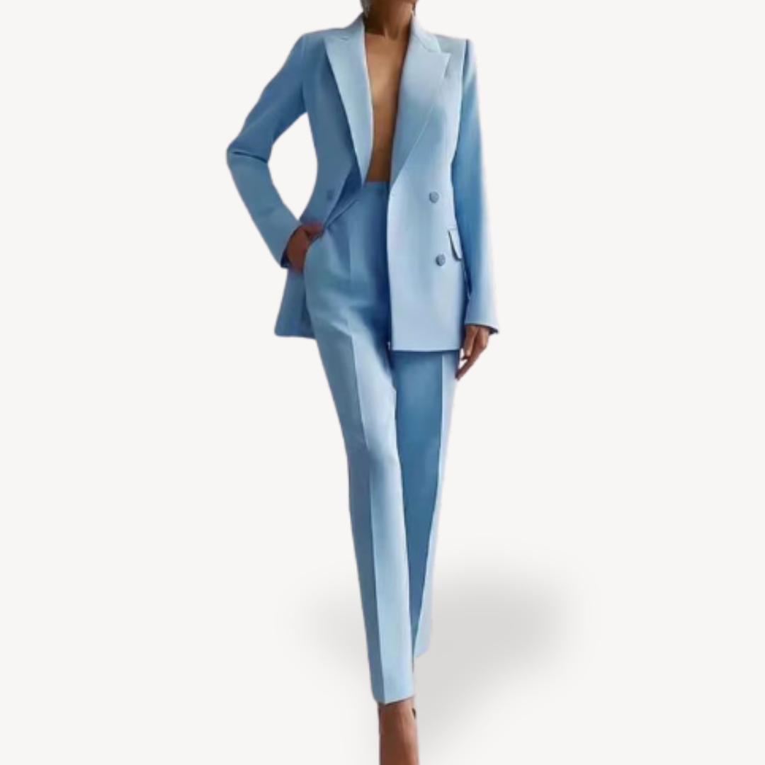 Women's formal tailored suit set in classic hue featuring long structured blazer with sharp professional silhouette