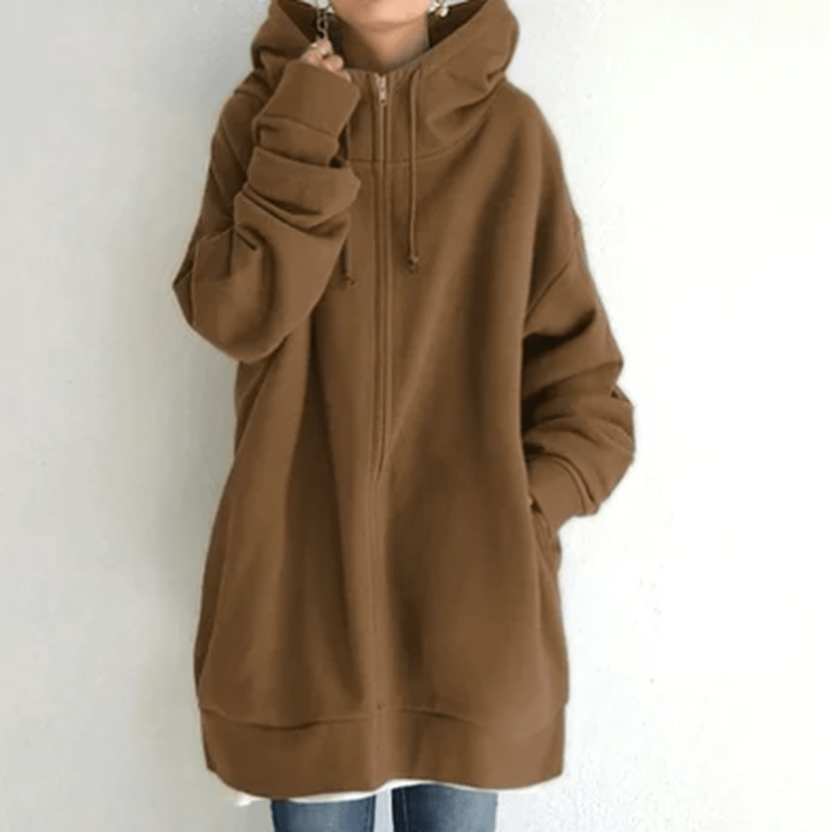 Women's relaxed fit full zip hoodie in neutral tone with minimalist design for casual everyday wear