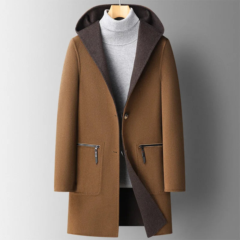 Charcoal wool hooded overcoat with minimalist hidden placket and clean tailored silhouette
