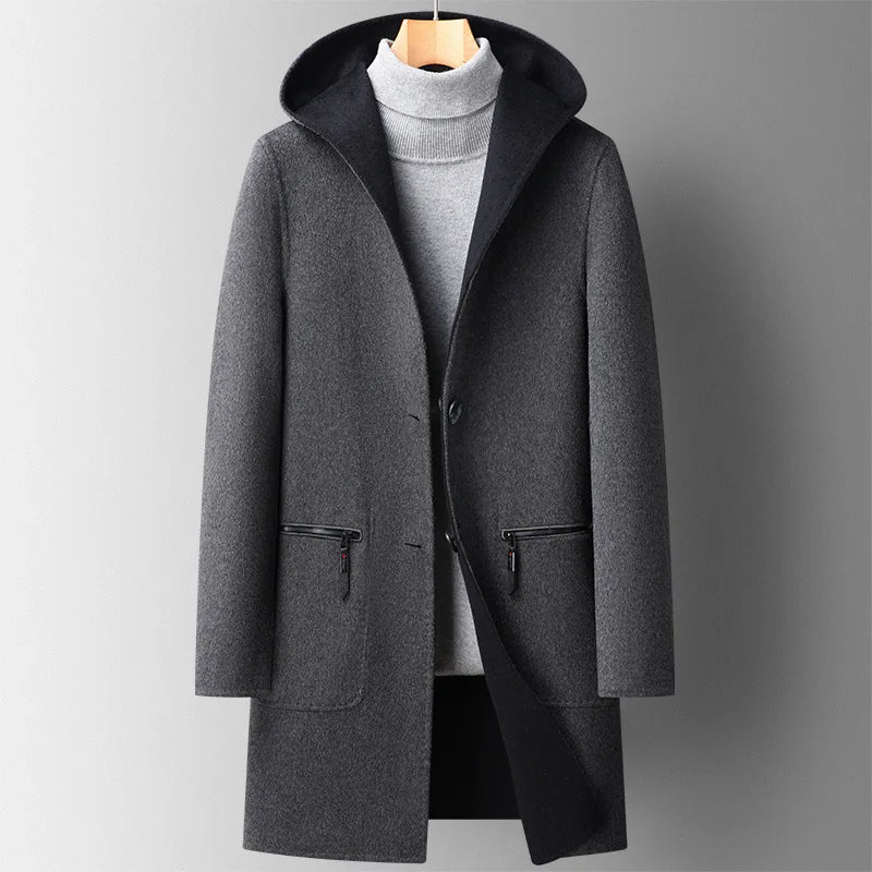 Charcoal wool hooded overcoat with clean front closure, tailored fit, and minimalist hidden placket