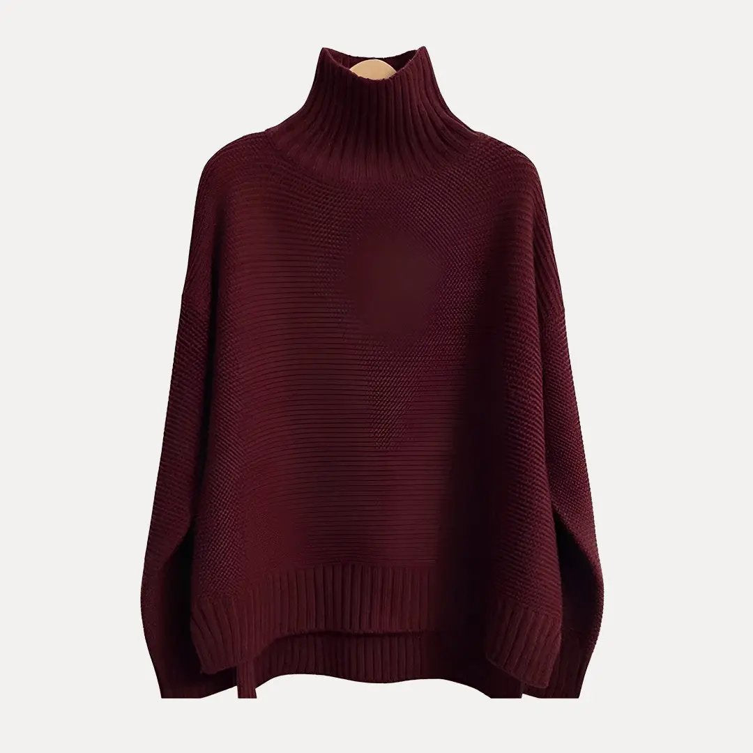 Yasmin cream wool turtleneck sweater with loose relaxed fit, perfect for layering in winter