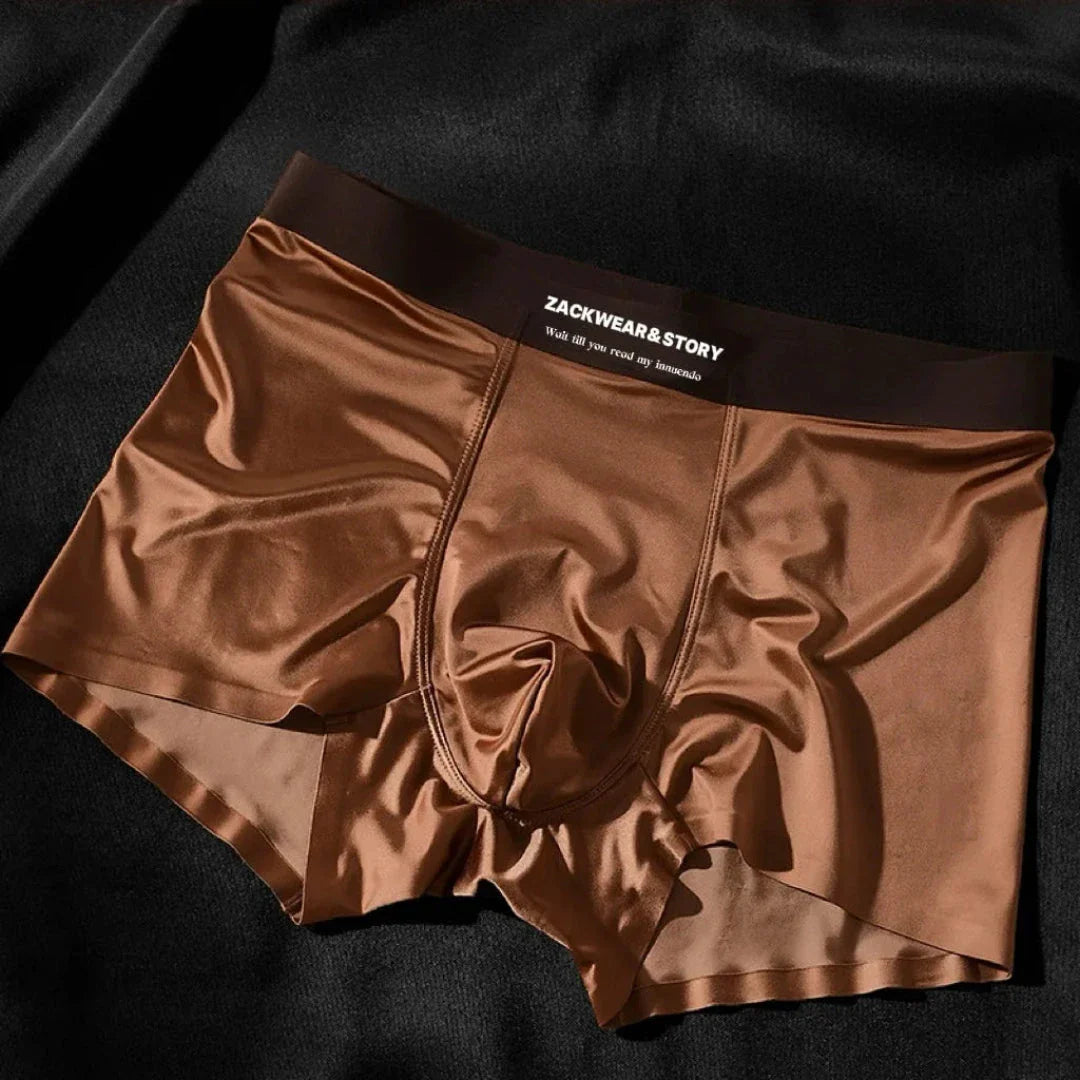 Men's ice silk stretch boxer briefs with sleek glossy finish and supportive contour pouch