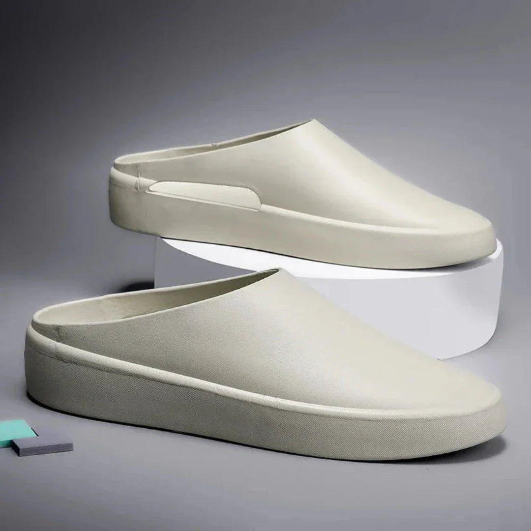 Men's minimalist closed-toe slip-on slides in neutral EVA cushioned ultra-lightweight indoor outdoor design