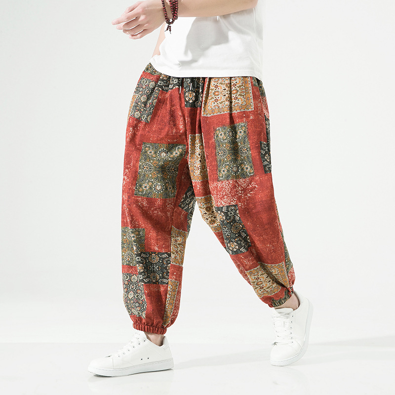 Beige linen-blend tapered pants with elastic drawstring waistband, relaxed drape, breathable everyday style