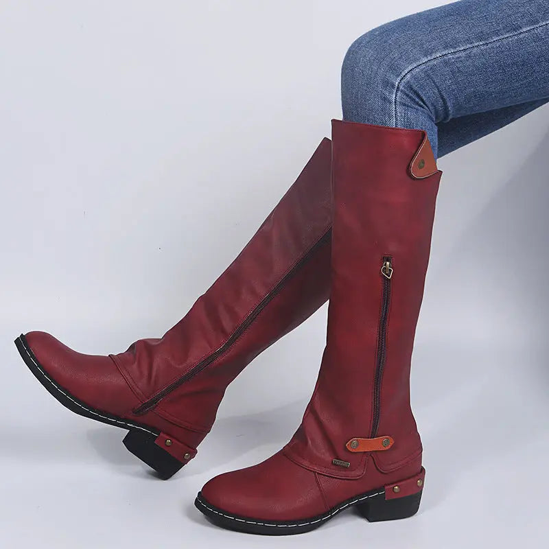 Women's chic zip-up ankle boots in sleek black, featuring a side zipper closure for effortless style