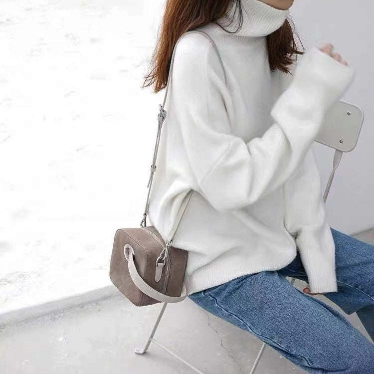 Zoé oversized turtleneck knit sweater in soft neutral tone, cozy wool-blend unisex winter style