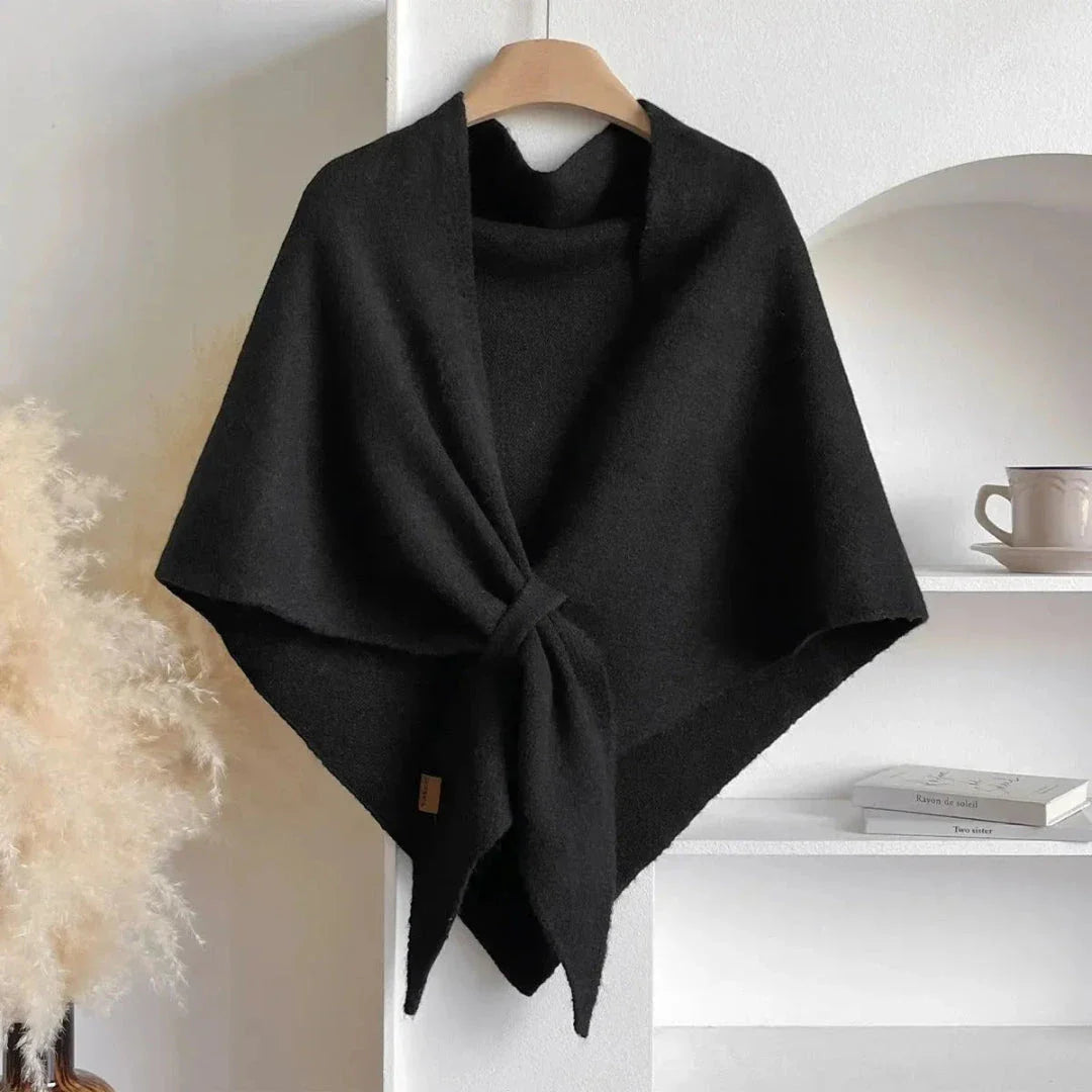 Soft knit shawl in neutral tones with tie-front design and elegant draped silhouette