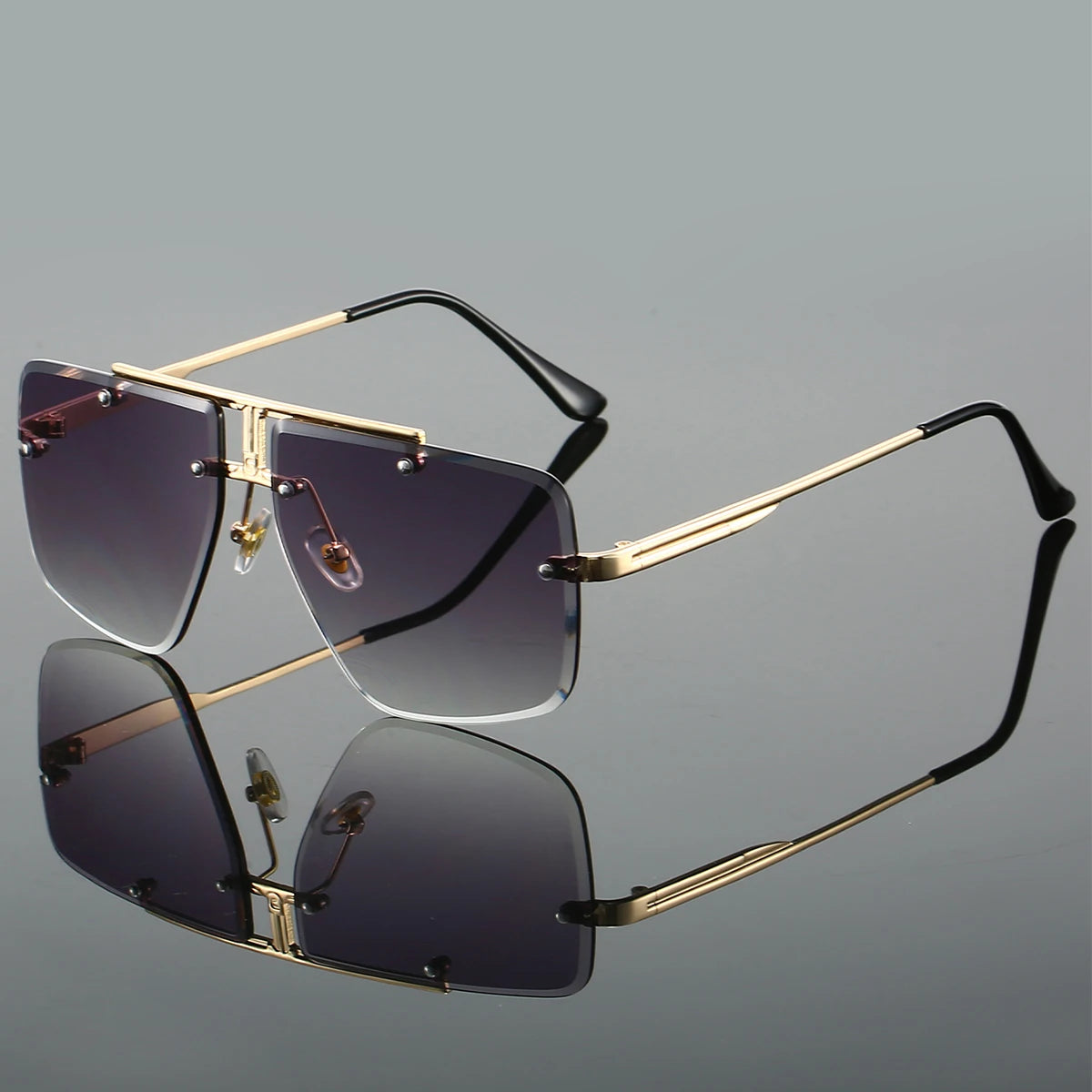 Zuri Flight Shades rimless aviator sunglasses with lightweight metal arms and UV-protective shield lenses