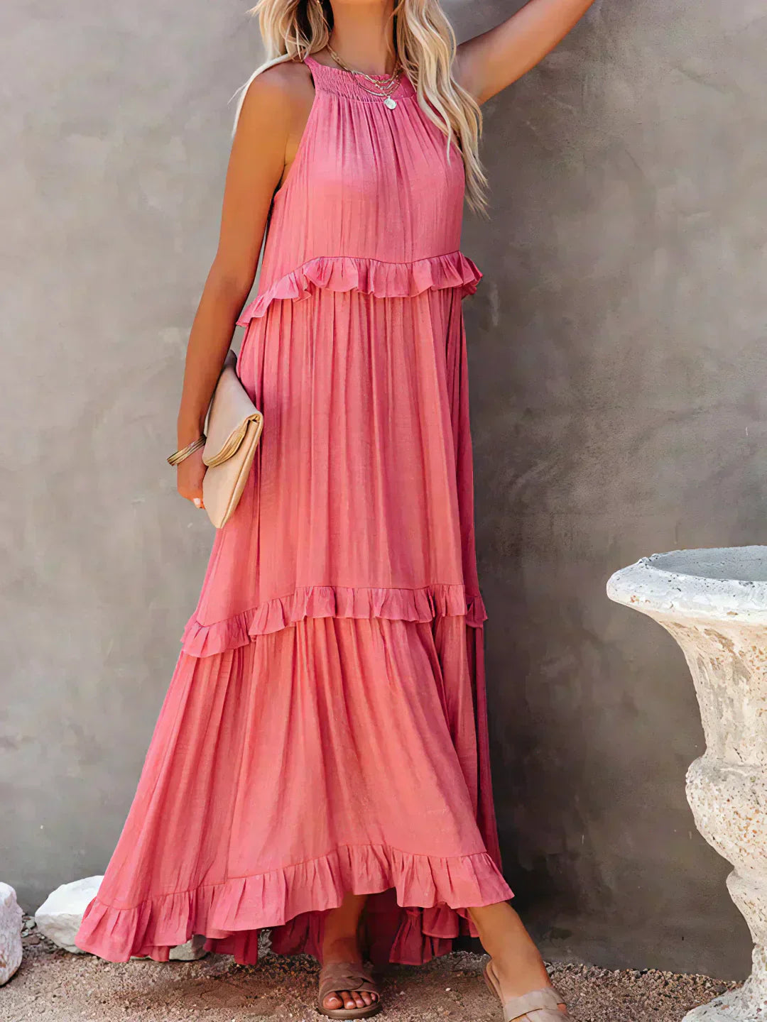 Elegant sleeveless dress with delicate ruffle accents, flattering feminine silhouette for special occasions