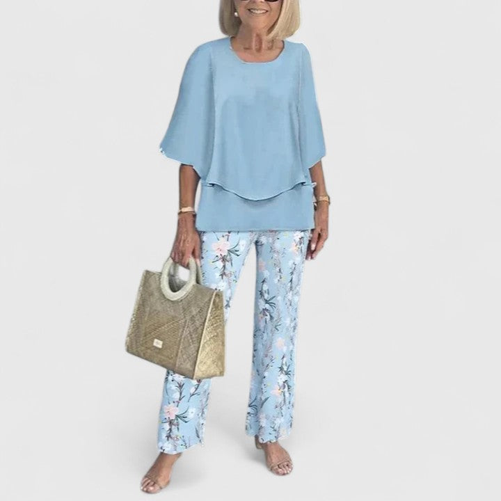 Sage green floral print two-piece set with relaxed layered top and wide-leg pants for women