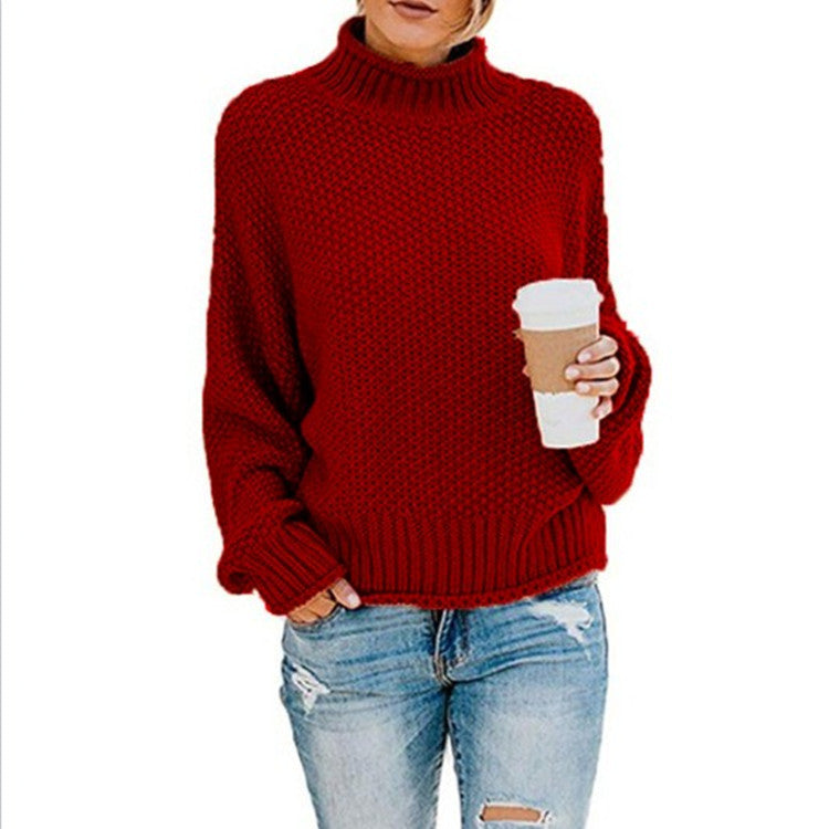 Women's chunky knit turtleneck sweater oversized fit with thick textured stitches for cozy warmth