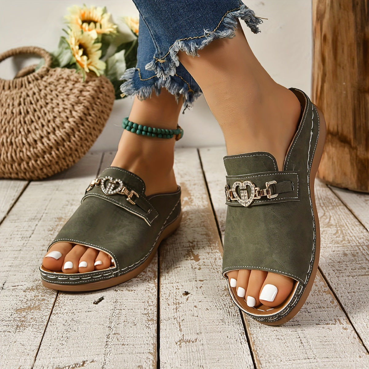 Women's flat adjustable sandals with feminine straps and cushioned arch support for all-day comfort