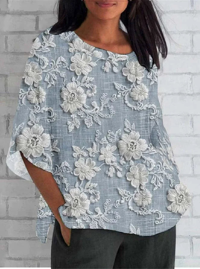 Vintage floral embroidered relaxed blouse with delicate lace detail in romantic soft tones