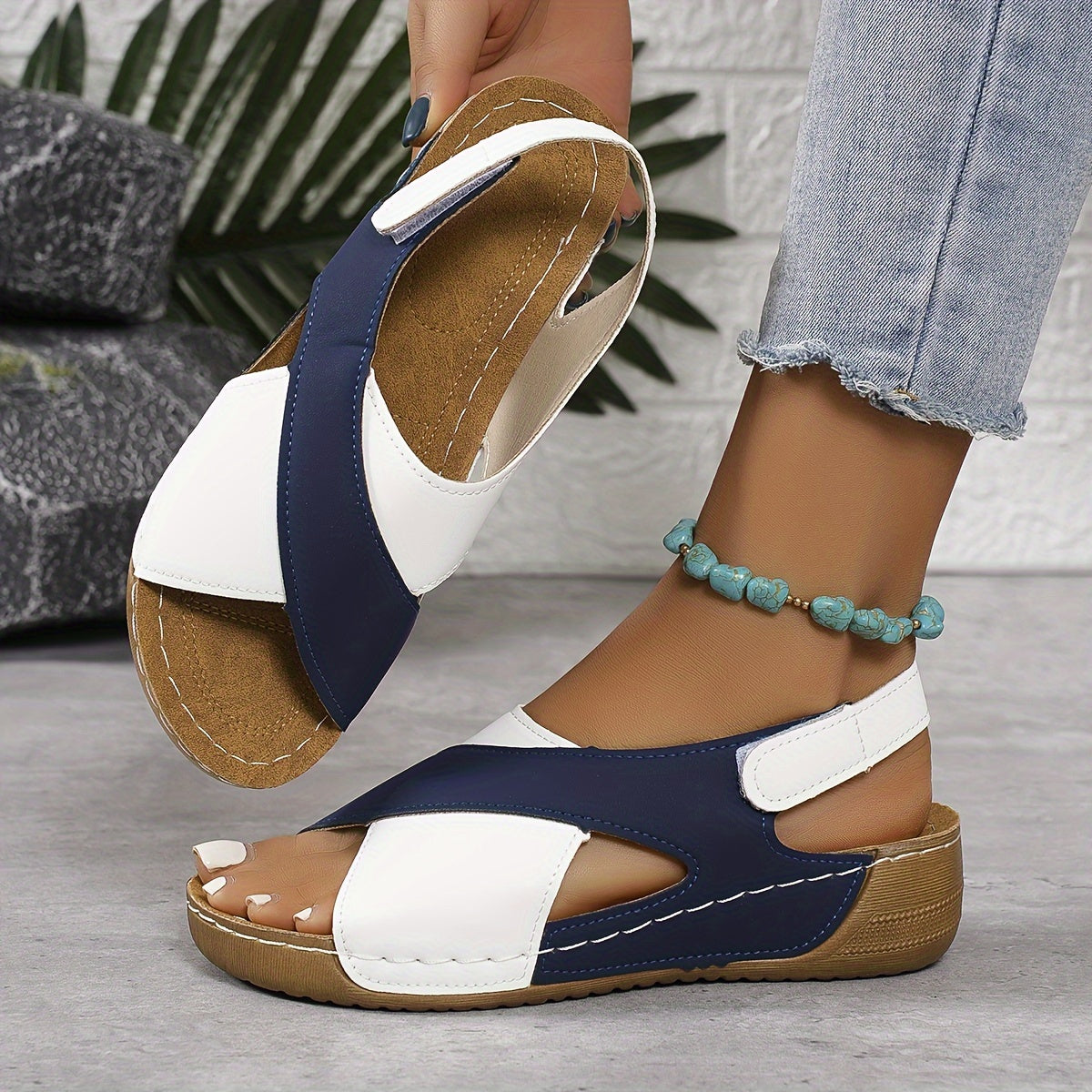 Women's beige comfort sandal with cushioned insole, minimalist silhouette, and all-day support