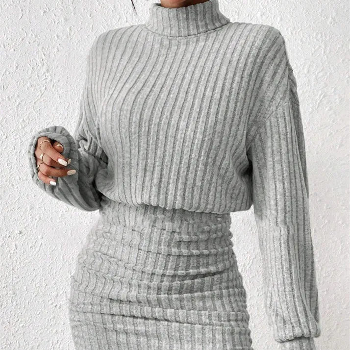 Ivory ribbed knit turtleneck midi dress with structured high neckline, cozy winter essential