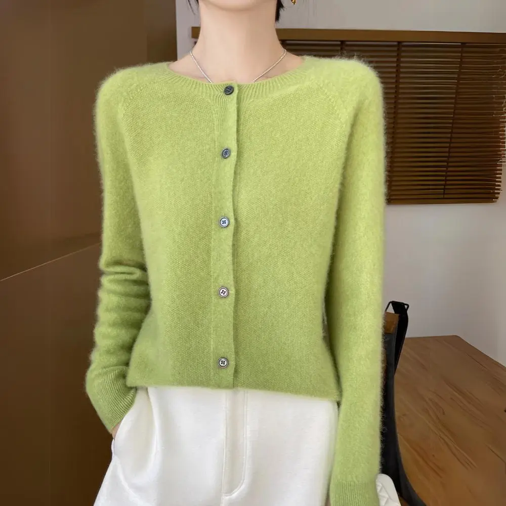 Warm orange merino wool cardigan with refined silhouette and soft breathable knit