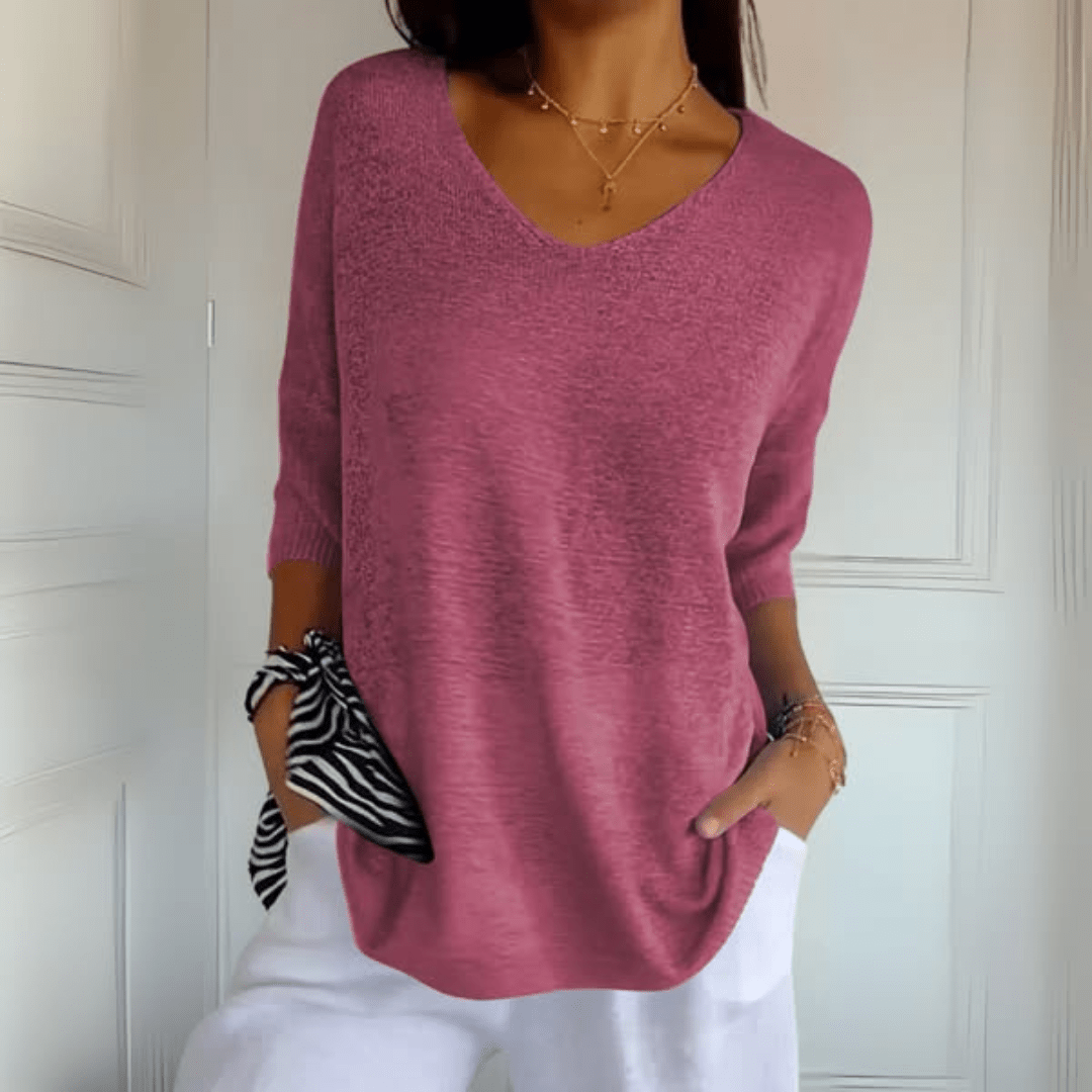 Soft knit v-neck top in neutral tone, relaxed everyday fit with flattering neckline detail